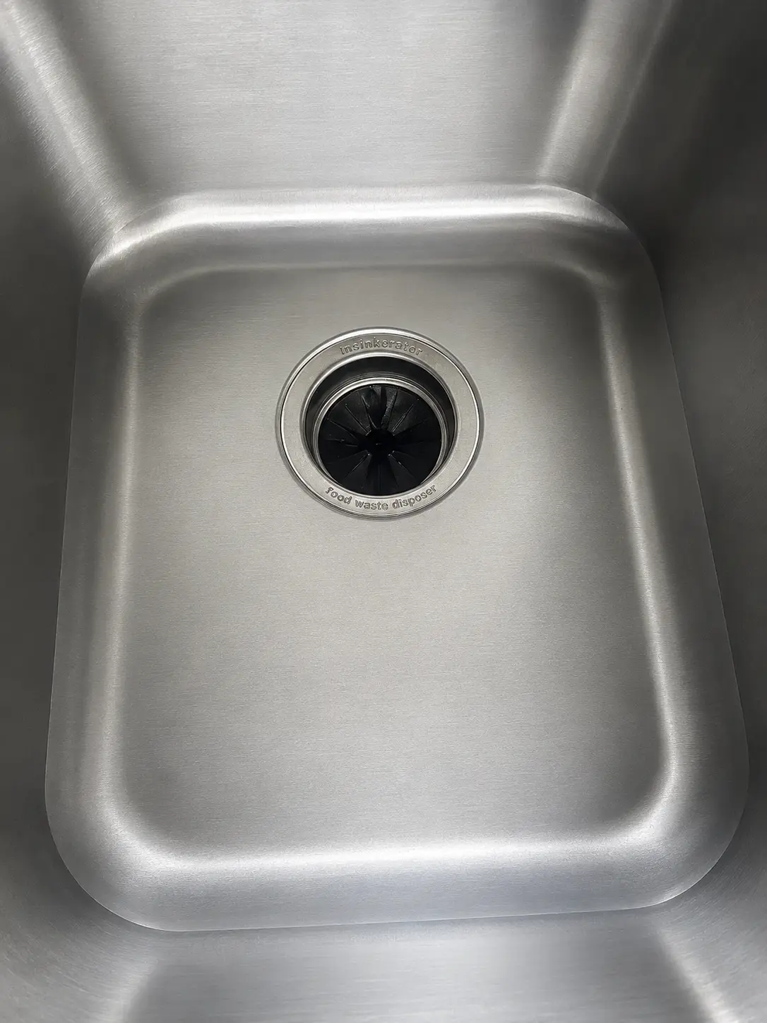Clean stainless steel kitchen sink drain