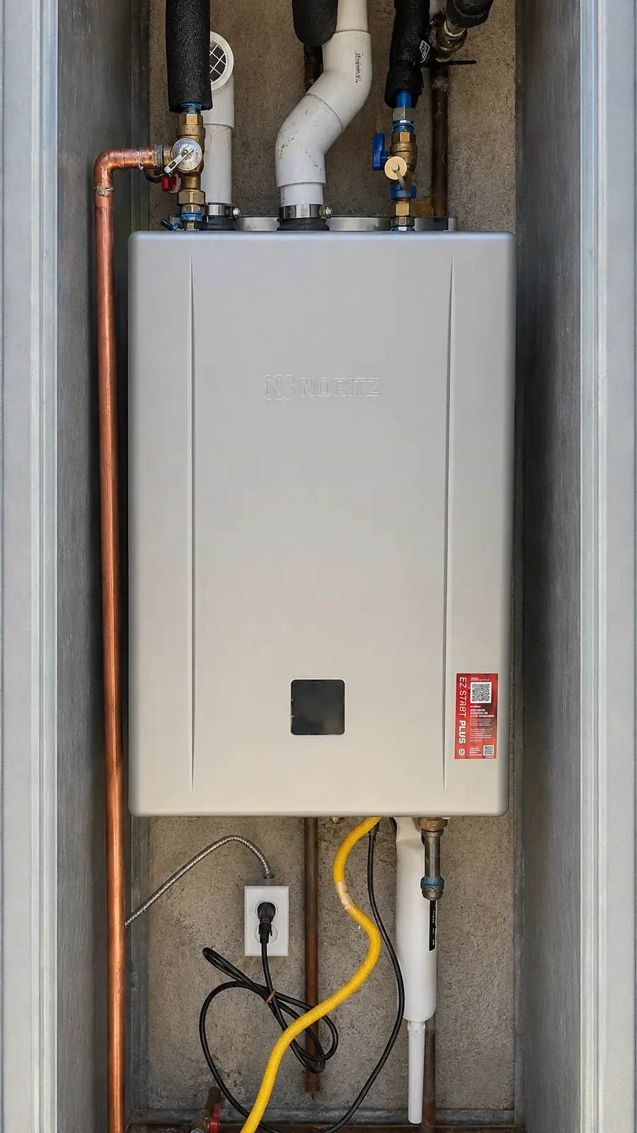Front view of recessed Noritz tankless water heater